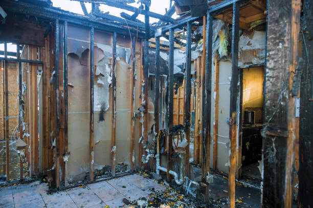 Professional Fire Damage Restoration technician working in Enochville, NC